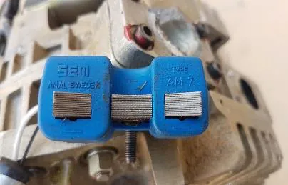 Blue SEM ignition coil marked AM7
