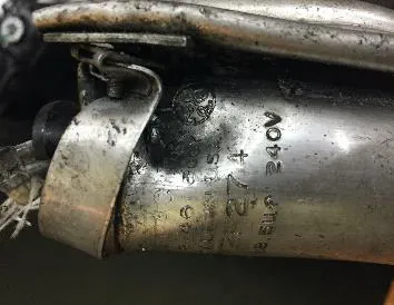 Capacitor strapped inside the debris